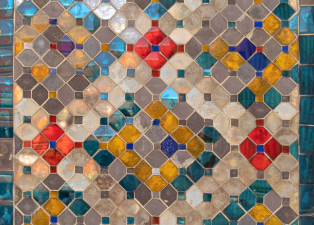istock Colorful art grid square mosaic tiles wall pattern surface texture. Close-up of architecture interior material for design decoration background. Thai style 1282711175