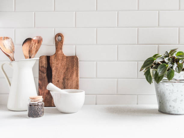 istock Kitchen background with kitchen utensils and houseplant 1282711179
