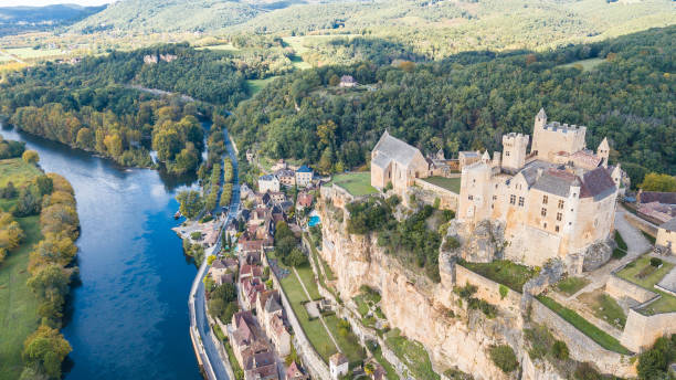 one of the most beautiful town in France, beynac and cazenac Beynac et cazenac, France. 12th october, 2020:aerial view of beynac et cazenac town, France sarlat la caneda stock pictures, royalty-free photos & images