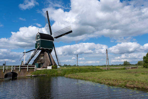 istock beautiful windmill landscape in the netherlands. Unesco Site. 1282711628