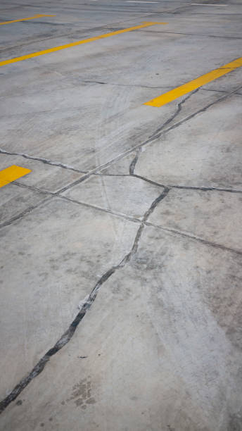 istock Lines and footprints on parking floor 1282712348