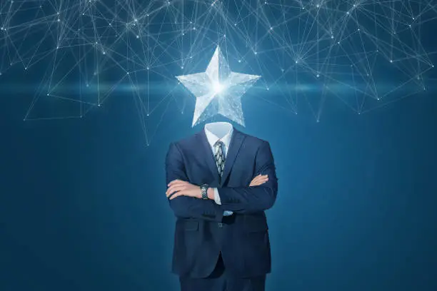 Photo of Businessman with a star Instead of a head in the network .