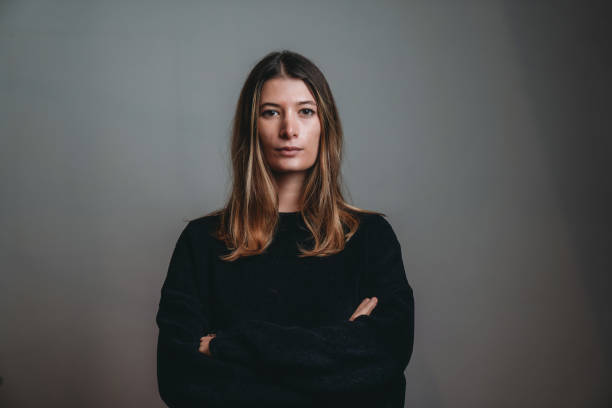 Portrait of a young adult beautiful woman looking at camera Portrait of a young adult beautiful woman looking at camera. Caucasian ethnicity. Serious expression. mediterranean woman portrait stock pictures, royalty-free photos & images