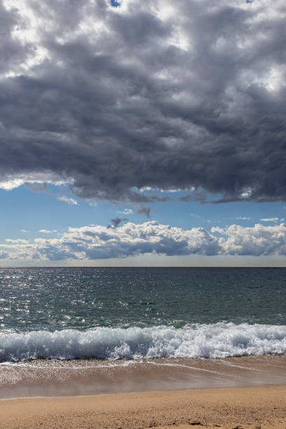 istock Dramatic clouds over the mediterranean sea, Costa Brava in Spain 1282720427