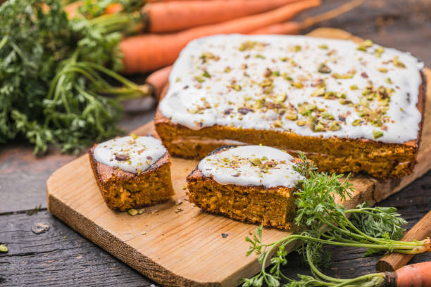 istock A  carrot cake with fresh carrot on wooden background 1282720561