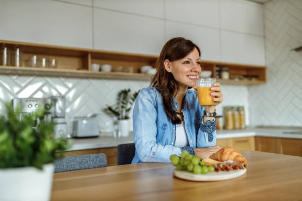 istock Smiling woman, at home, enjoying. 1282722451