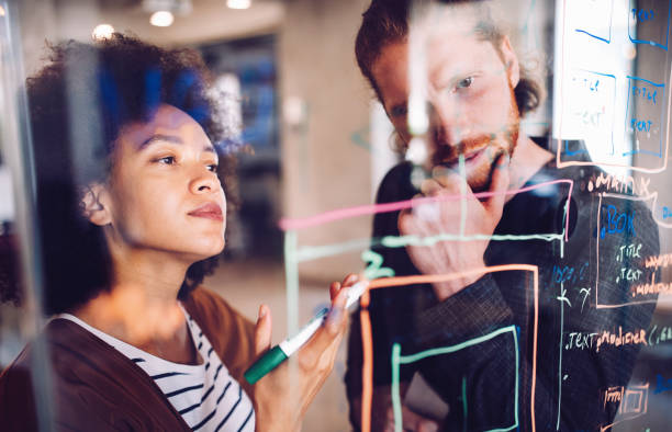 istock Collaboration and analysis by business people working in office 1282722591