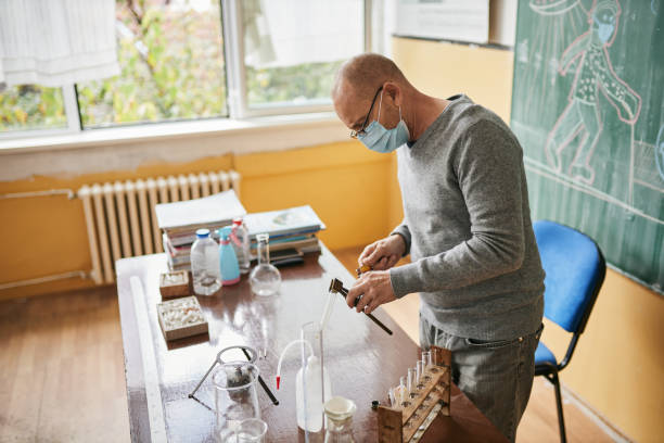 istock Responsible teacher preparing everything for his chemistry class and scientific experiment his students gonna do 1282723830