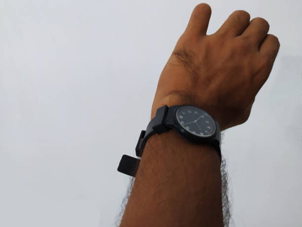 Stylish appearance of looking the time on young human hand