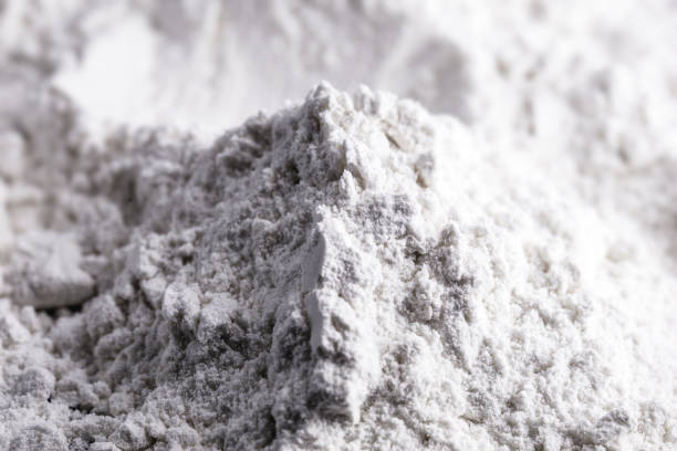 istock Titanium dioxide (TiO2) powder for cosmetics, isolated black background 1282726742