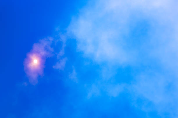 Moon rise in clouds and smoke