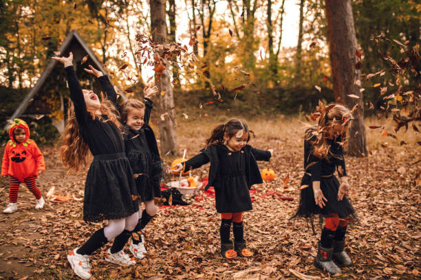 istock Playful kids enjoying a Halloween party 1282730098