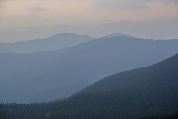 istock Summer misty evening mountain tops 1282731072