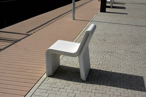 Modern park bench in the pedestrian zone