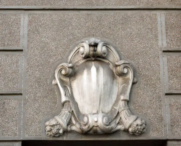 Photo of Classic ornament as a decoration on the facade of an old building