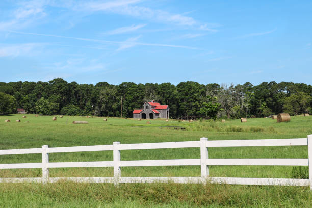istock old wooden barn with red roof 1282734326
