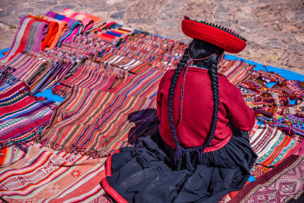 istock Peruvian woman selling souvenirs, The Sacred Valley, Peru 1282735420