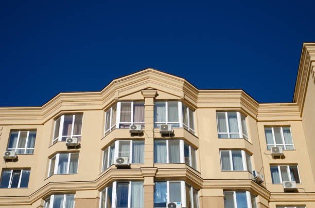 istock Multi-storey house against the blue sky. Background 1282735467