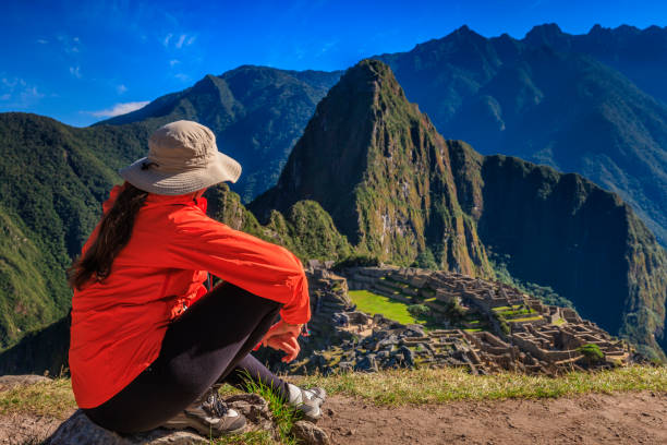 istock Female tourist looking at Machu Picchu 1282735494