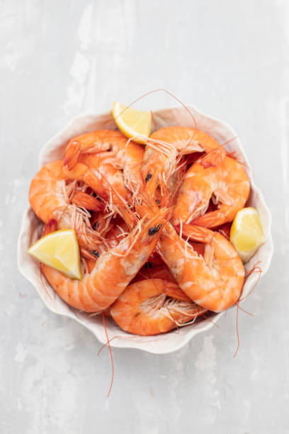 istock boiled shrimps with fresh lemon in white bowl 1282737832