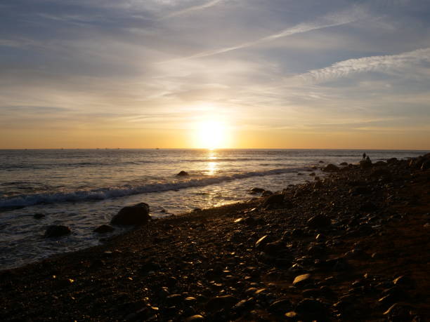 istock Early morning sunrise over sea 1282740011