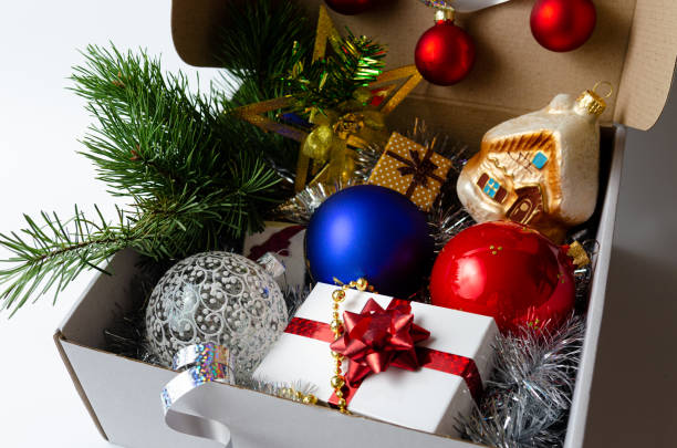 istock Box with Christmas toys on a white background 1282740285