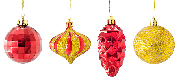 set of gold and red christmas tree decorations isolated on white background.