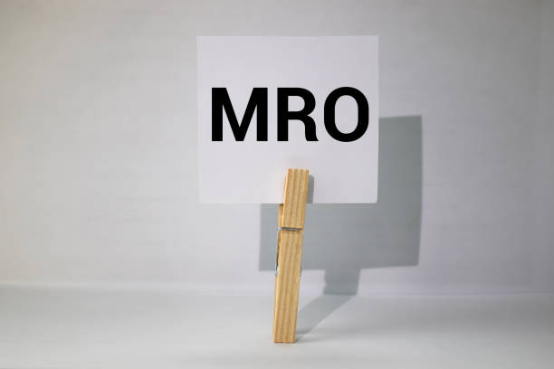 istock MRO - Maintenance, Repair, and Operations acronym, business concept background. 1282742516