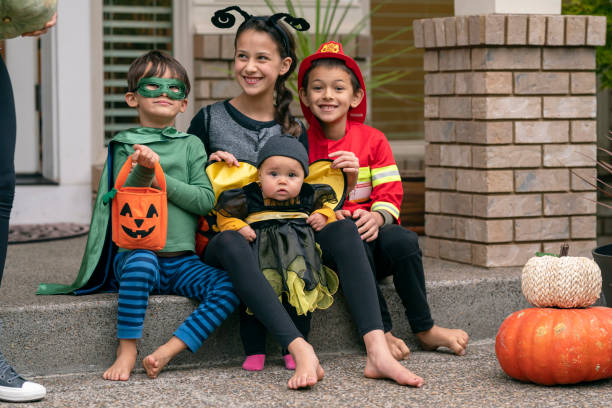istock Siblings celebrating Halloween at home 1282744554