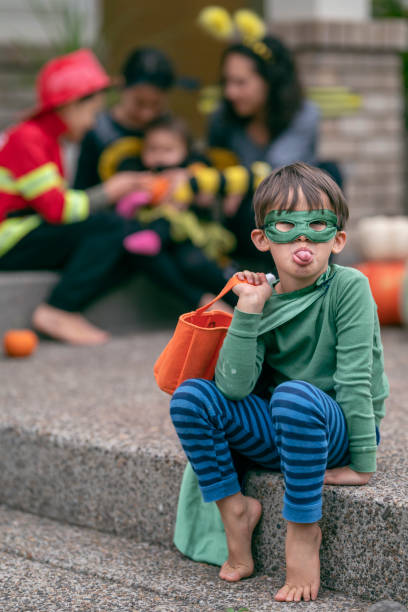 istock Goofy little boy trick or treating 1282744557