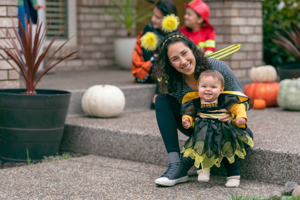istock Cute baby girl celebrating her first Halloween 1282744571