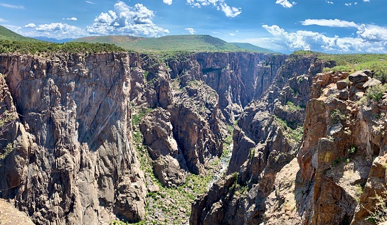 View into the depth of Black Canyon of Gunnison river in Colorado, USA.