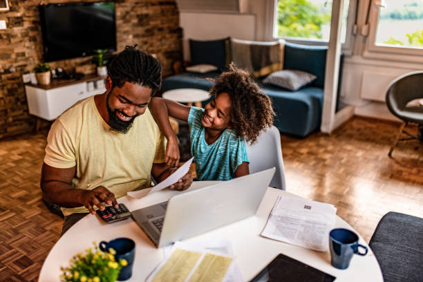 istock Happy father working with his daughter supporting him. 1282746898
