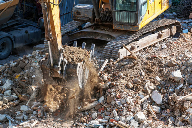 istock Yellow excavator is working on the construction site 1282746913