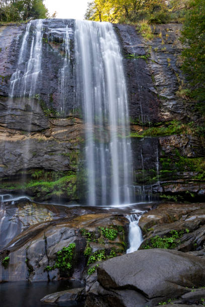 istock The waterfall flowing through the rocks in forest 1282747749