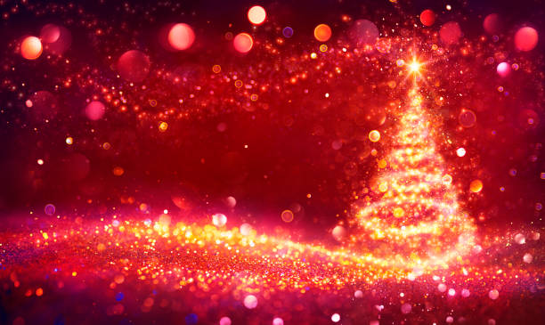 istock Golden Christmas Tree In Shiny Defocused Background 1282751720