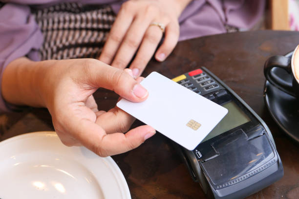 istock Payment terminal charging from a card, contactless payment. 1282752613
