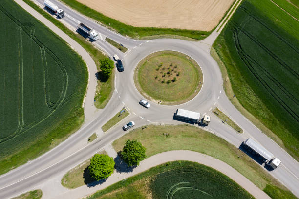 istock Traffic Circle with Traffic, Aerial View 1282755938