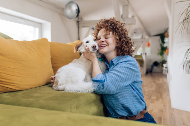 istock Girl bonding and enjoying with her dog 1282756231