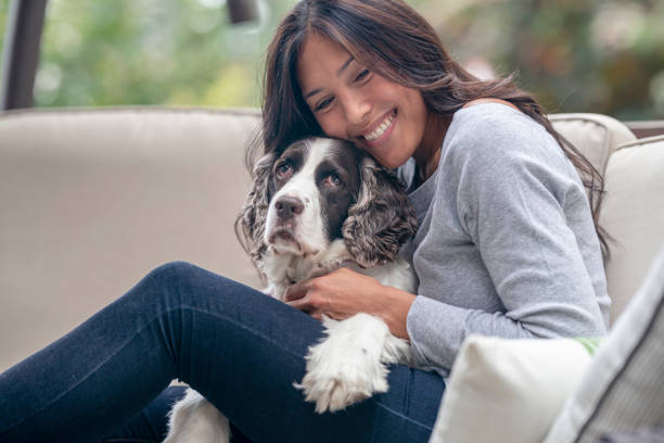 istock Attractive Pacific Islander Woman Spending Time With Her Dog Outside 1282756400