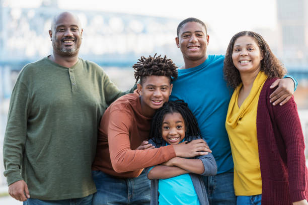 istock Family, three children standing together on waterfront 1282760759