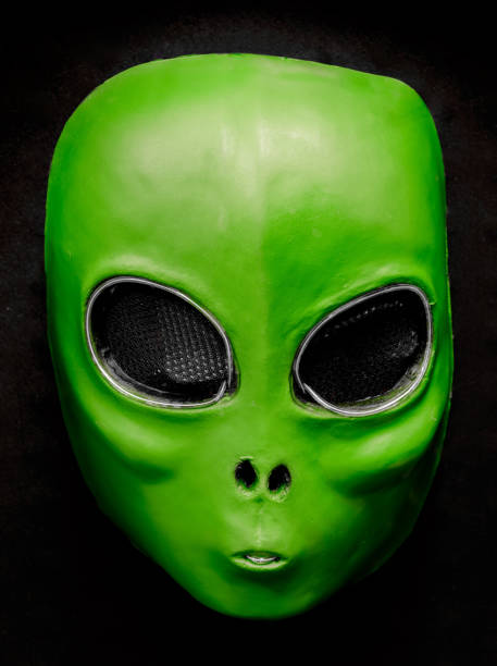 istock El Wire Alien Face Mask Isolated Against Black Background 1282766023