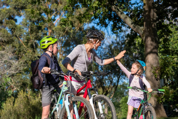 istock Mother riding to school with her children 1282767814