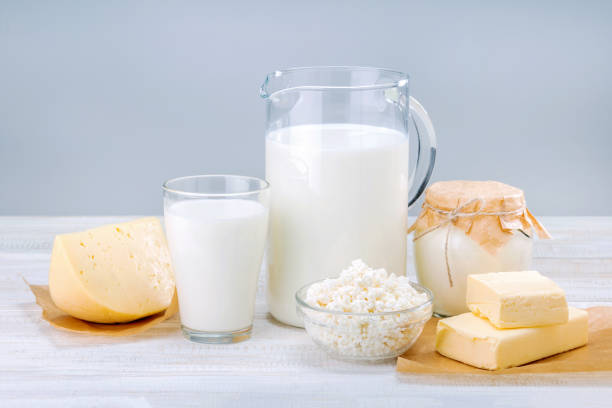 istock Fresh dairy products on white wooden surface. 1282769443