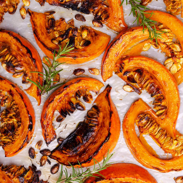 istock Baked pumpkin slices with seeds 1282769456