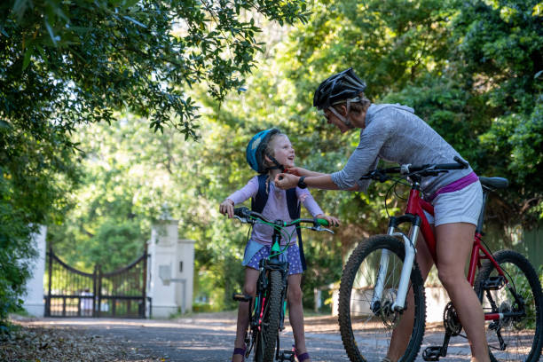 istock Mother riding to school with her daughter 1282769503