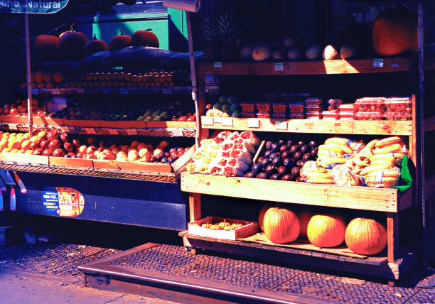 Seattle, WA, USA October 24, 2014  Customers shop for fresh fruit and vegetables at the Pike Street Market in Seattle