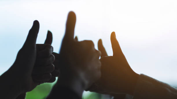 istock people making thumb up hands sign in circle 1282778750