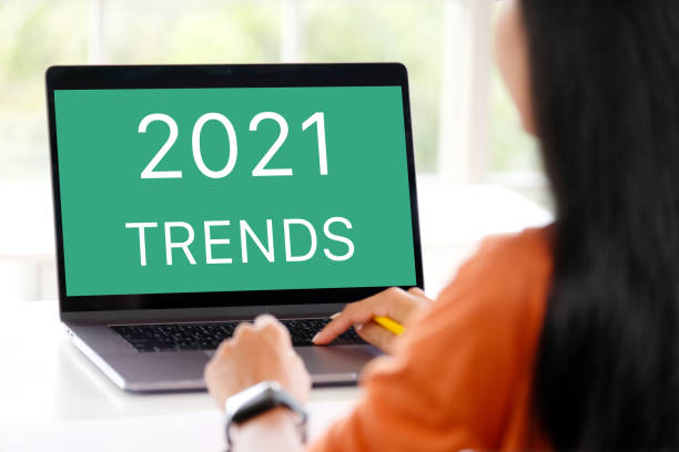 istock 2021 trends on laptop computer screen background, business plan and technology concept 1282781509