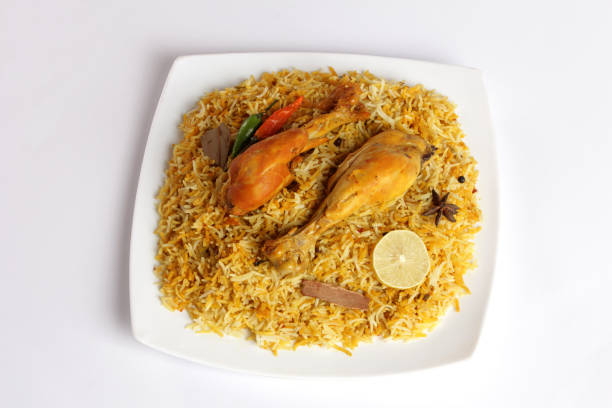 Indian Traditional Bombay Biryani, Chicken Biryani is a Special Pakistani Food. Indian Traditional Bombay Biryani, Chicken Biryani is a Special Pakistani Food. Famous Ramadan, Eid, Diwali, Holi or Christmas Meal. masala stock pictures, royalty-free photos & images
